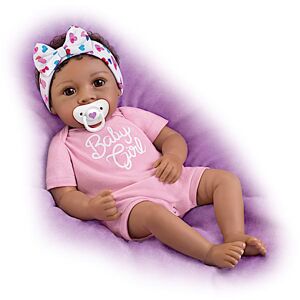 The Ashton-Drake Galleries Little Baby Girl Vinyl Doll With Magnetic Pacifier Image